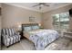 Spacious bedroom with comfortable seating and large window at 1460 Tannery Hts, Mesquite, NV 89034