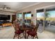 Bright dining area with a table and chairs near sliding doors at 1460 Tannery Hts, Mesquite, NV 89034