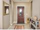 Elegant entryway with wood door and tile floors at 1460 Tannery Hts, Mesquite, NV 89034