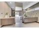 Modern bathroom with dual vanities, sleek cabinets, and contemporary fixtures, offering a spa-like experience at 1469 Dragon Stone Pl, Henderson, NV 89012