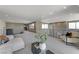 Bright living room featuring neutral walls and plush carpeting at 1469 Dragon Stone Pl, Henderson, NV 89012