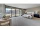 Bright main bedroom featuring a balcony with mountain views at 1469 Dragon Stone Pl, Henderson, NV 89012