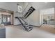 Open staircase design featuring modern railings and neutral walls complementing the bright, open space at 1469 Dragon Stone Pl, Henderson, NV 89012