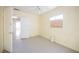 Simple bedroom with mirrored wall and window at 203 N 13Th St, Las Vegas, NV 89101