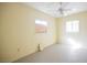 Simple bedroom with ceiling fan and hardwood floors at 203 N 13Th St, Las Vegas, NV 89101