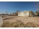 Bright yellow house with small yard at 203 N 13Th St, Las Vegas, NV 89101