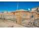 Brick house exterior with chain link fence at 203 N 13Th St, Las Vegas, NV 89101