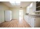 Spacious kitchen with white cabinets and appliances at 203 N 13Th St, Las Vegas, NV 89101