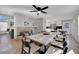 Spacious dining area with a large wooden table and seating for ten at 204 Appian Way, Henderson, NV 89002