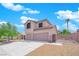 Two-story house with three-car garage and gated driveway at 204 Appian Way, Henderson, NV 89002