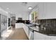 Bright kitchen, white cabinets, granite counters at 204 Appian Way, Henderson, NV 89002