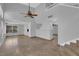 High-ceiling living room with tile floors and a ceiling fan at 204 Appian Way, Henderson, NV 89002