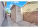 Yard with storage shed and gravel pathway at 204 Appian Way, Henderson, NV 89002