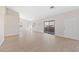 Spacious living room featuring light walls and wood-look floors at 2050 N Los Feliz St # 133, Las Vegas, NV 89156