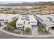 Aerial view of modern home with solar panels and pool at 21 Canyon Bay Dr, Henderson, NV 89011