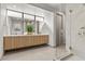 Modern bathroom features a floating vanity, large shower, and sleek design at 21 Canyon Bay Dr, Henderson, NV 89011