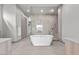 Spa-like bathroom with soaking tub and glass shower at 21 Canyon Bay Dr, Henderson, NV 89011