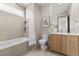 Elegant bathroom with soaking tub and wood vanity at 21 Canyon Bay Dr, Henderson, NV 89011