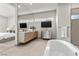 Bathroom with a large soaking tub and double vanity at 21 Canyon Bay Dr, Henderson, NV 89011