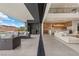 Open living space with sliding glass doors opening to patio and pool at 21 Canyon Bay Dr, Henderson, NV 89011