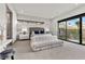 Bright main bedroom with a tufted headboard and comfortable seating at 21 Canyon Bay Dr, Henderson, NV 89011