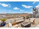 Modern rooftop patio with fire pit and scenic view at 21 Canyon Bay Dr, Henderson, NV 89011