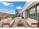 Spacious rooftop patio with fire pit and city views at 21 Canyon Bay Dr, Henderson, NV 89011