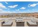 This upper deck features outdoor seating around a fire pit and sweeping views of the area at 21 Canyon Bay Dr, Henderson, NV 89011