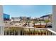 View from the balcony showcases the vibrant cityscape and High Roller observation wheel at 211 E Flamingo Rd # 202, Las Vegas, NV 89169