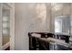 Modern bathroom with a glass shower, contemporary vanity, and stylish lighting fixtures at 2200 Nordica Ct, Las Vegas, NV 89117