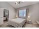 Comfortable bedroom with a ceiling fan and access to an ensuite bathroom at 2200 Nordica Ct, Las Vegas, NV 89117