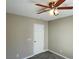 Neutral toned bedroom features a ceiling fan and carpet at 2420 Sweetgum St, Las Vegas, NV 89108