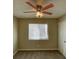 Bedroom features a ceiling fan and window at 2420 Sweetgum St, Las Vegas, NV 89108