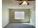 Neutral toned bedroom offers a closet and a window for plenty of natural light at 2420 Sweetgum St, Las Vegas, NV 89108