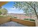 Paver backyard with mature trees and bushes with great views of mountains in the distance at 25 Via Mantova # 2, Henderson, NV 89011