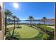 Enjoy this lush putting green with a lake view at 25 Via Mantova # 2, Henderson, NV 89011