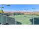 A view of the community's outdoor tennis courts on a clear day at 25 Via Mantova # 2, Henderson, NV 89011