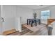 Simple dining area with a dark wood table and chairs at 2795 Atomic Tangerine Way # 5, Las Vegas, NV 89183