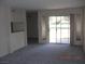 Living room with sliding glass doors to patio at 2838 Loveland Dr # 1619, Las Vegas, NV 89109