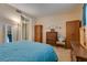 Bright bedroom with a queen bed and lots of natural light at 2851 S Valley View Blvd # 1172, Las Vegas, NV 89102