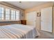 Bedroom with window shutters, double door closet, and striped bedding at 2851 S Valley View Blvd # 1172, Las Vegas, NV 89102