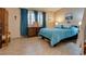 Bedroom with a queen bed and ample closet space at 2851 S Valley View Blvd # 1172, Las Vegas, NV 89102