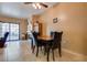 Bright dining room with wood table and four black chairs at 2851 S Valley View Blvd # 1172, Las Vegas, NV 89102