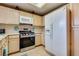 White refrigerator and stainless steel appliances in the kitchen at 2851 S Valley View Blvd # 1172, Las Vegas, NV 89102