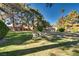 Expansive green lawn with trees and seating at 2851 S Valley View Blvd # 1172, Las Vegas, NV 89102