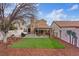 Landscaped backyard featuring a patio and grassy area at 3321 Mariner Bay St, Las Vegas, NV 89117