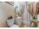 Cozy bathroom with a shower-tub combo with neutral tile floors at 3327 Rio Grande St, Las Vegas, NV 89115