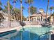 Community swimming pool with clubhouse view at 3555 Meridale Dr # 1145, Las Vegas, NV 89147