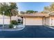 Charming home featuring a two-car garage, desert landscaping, and a welcoming entrance at 3663 Laguna Verde Way, Las Vegas, NV 89121