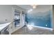 Cozy kitchen nook with double doors leading to a balcony and a view of the outdoors at 3663 Laguna Verde Way, Las Vegas, NV 89121